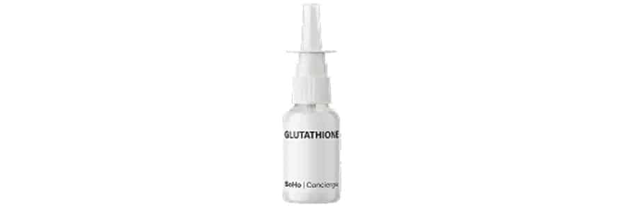White spray bottle labeled glutathione